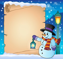 Image showing Parchment with snowman holding lantern