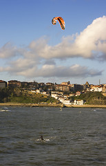 Image showing beach sport water kite surf. a man practicing kite surfing in the beach