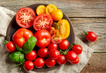 Image showing plate of various colorful tomatoes