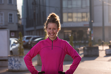 Image showing woman  stretching before morning jogging