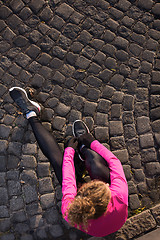 Image showing woman  stretching before morning jogging