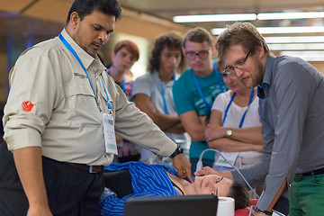 Image showing Participants learning new ultrasound techniques on medical congress.