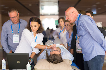 Image showing Participants learning new ultrasound techniques on medical congress.