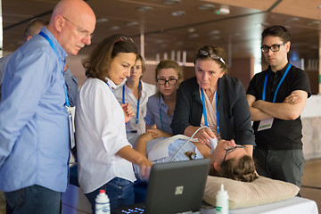 Image showing Participants learning new ultrasound techniques on medical congress.