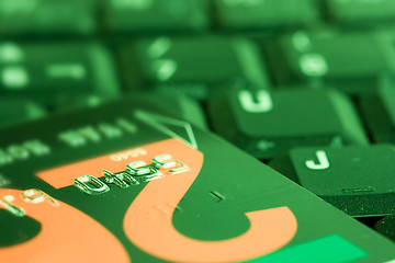 Image showing business online shopping credit card on a keyboard ready to buy in internet