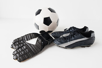 Image showing close up of soccer ball, football boots and gloves