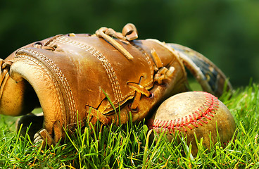 Image showing Old glove and baseball