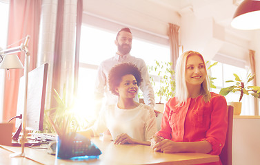 Image showing happy creative team in office