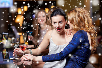 Image showing happy women with drinks at night club