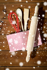 Image showing close up of kitchenware for baking on wooden board