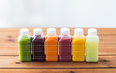 Image showing bottles with different fruit or vegetable juices