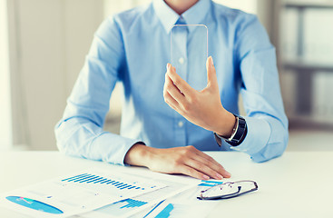 Image showing close up of woman with transparent smartphone