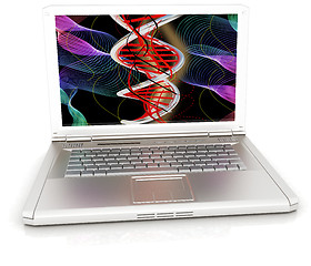 Image showing Laptop with dna medical model background on laptop screen. 3d il