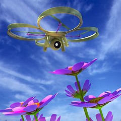 Image showing Drone, quadrocopter, with photo camera against the sky and Beaut