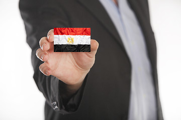 Image showing Businessman holding business card with Egypt flag