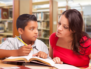 Image showing Hispanic Mother and Son Studying In Library