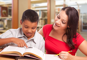 Image showing Hispanic Mother and Son Studying In Library