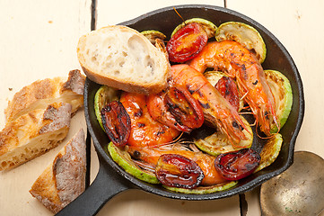 Image showing roasted shrimps with zucchini and tomatoes