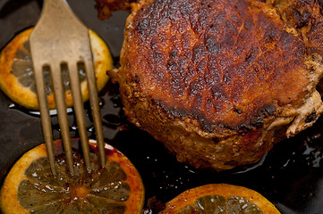 Image showing pork chop seared on iron skillet