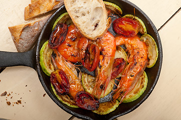 Image showing roasted shrimps with zucchini and tomatoes