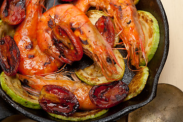 Image showing roasted shrimps with zucchini and tomatoes