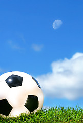 Image showing Closeup of a soccerball against a blue sky