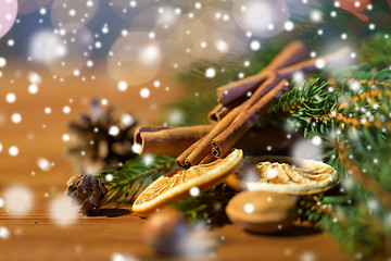 Image showing christmas fir branch, cinnamon and dried orange