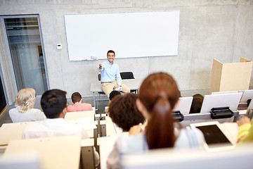 Image showing group of students and teacher at lecture