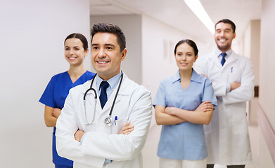 Image showing group of happy medics or doctors at hospital