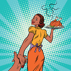 Image showing follow me African-American housewife with roast Turkey