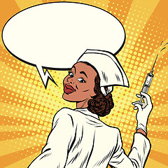 Image showing African American nurse with a syringe for vaccination