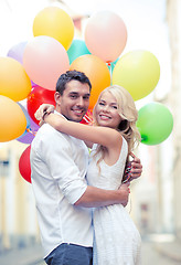 Image showing couple with colorful balloons