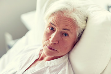 Image showing senior woman patient lying in bed at hospital ward