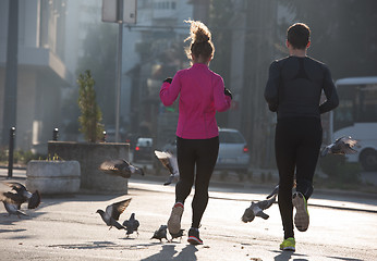 Image showing young  couple jogging