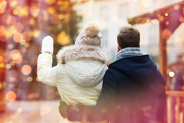 Image showing close up of couple in old town at christmas