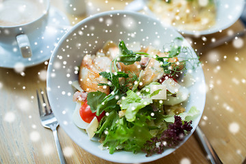 Image showing close up of caesar salad on plate at restaurant