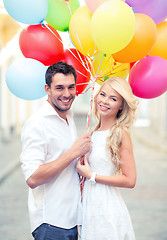 Image showing couple with colorful balloons