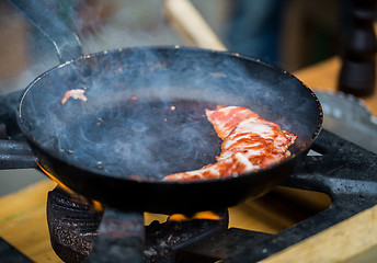 Image showing close up of food frying pan at street market