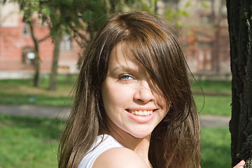 Image showing Portrait of the smiling beauty girl outdoor