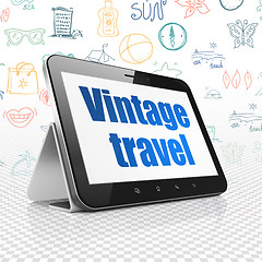 Image showing Vacation concept: Tablet Computer with Vintage Travel on display