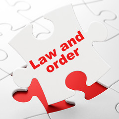 Image showing Law concept: Law And Order on puzzle background