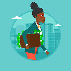 Image showing Business woman carrying briefcase full of money.