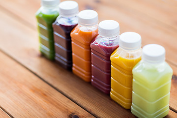 Image showing bottles with different fruit or vegetable juices