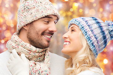 Image showing close up of happy smiling couple in winter clothes