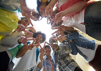 Image showing international students showing peace or v sign