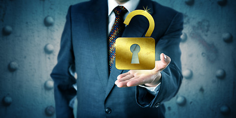 Image showing Business Manager Offering A Golden Open Padlock