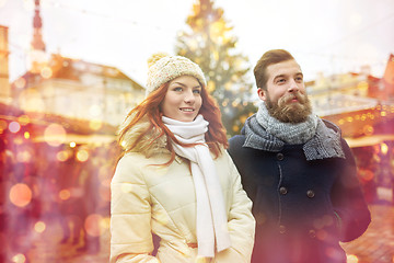 Image showing happy couple walking in old town