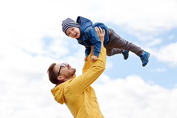 Image showing father with son playing and having fun outdoors