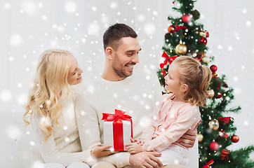 Image showing happy family at home with christmas tree