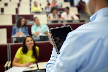 Image showing teacher with tablet pc and students at lecture